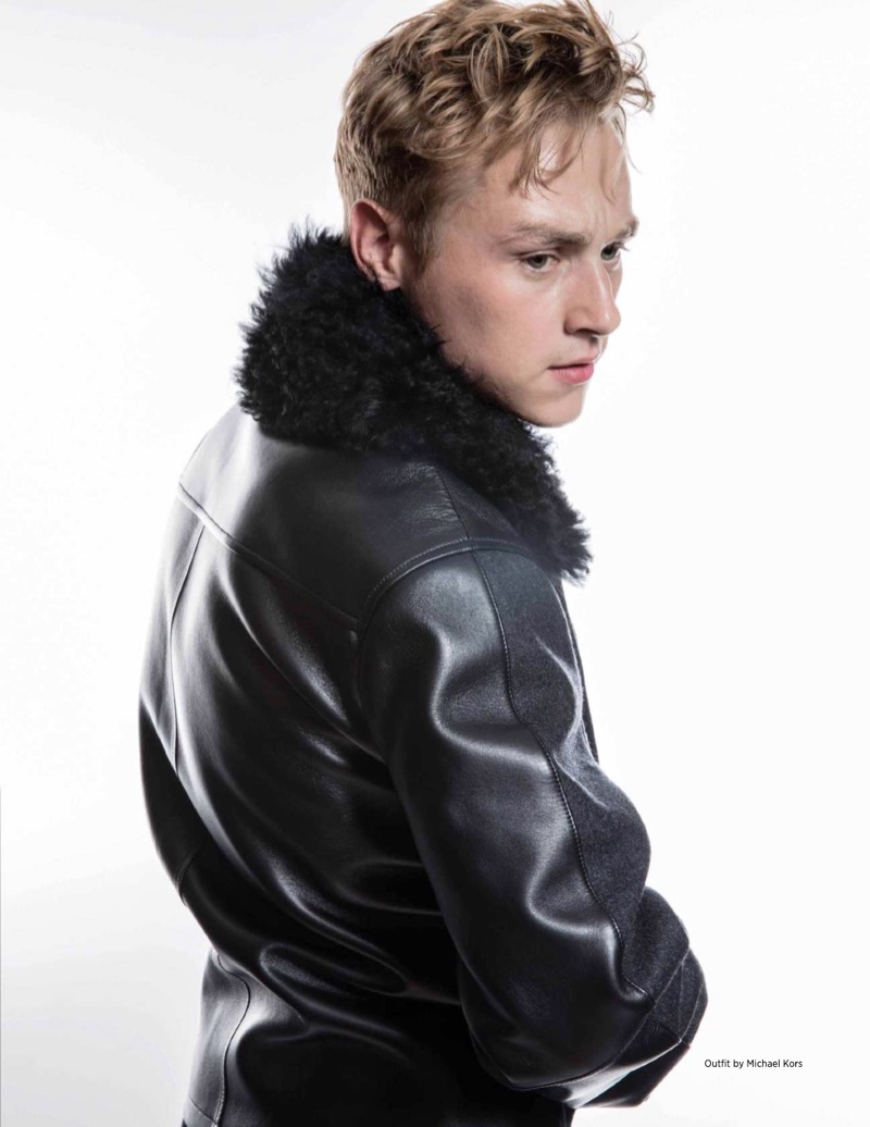 Sporting a leather bomber jacket, Ben Hardy appears in a new photo shoot.