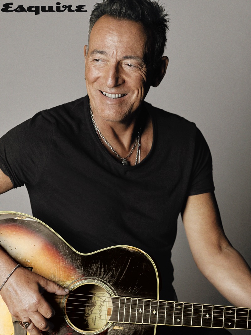 All smiles, Bruce Springsteen wears a simple tee from H&M.