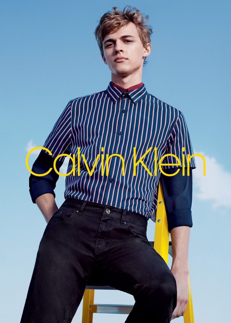 Max Barczak models a striped shirt for Calvin Klein's fall-winter 2018 men's campaign.