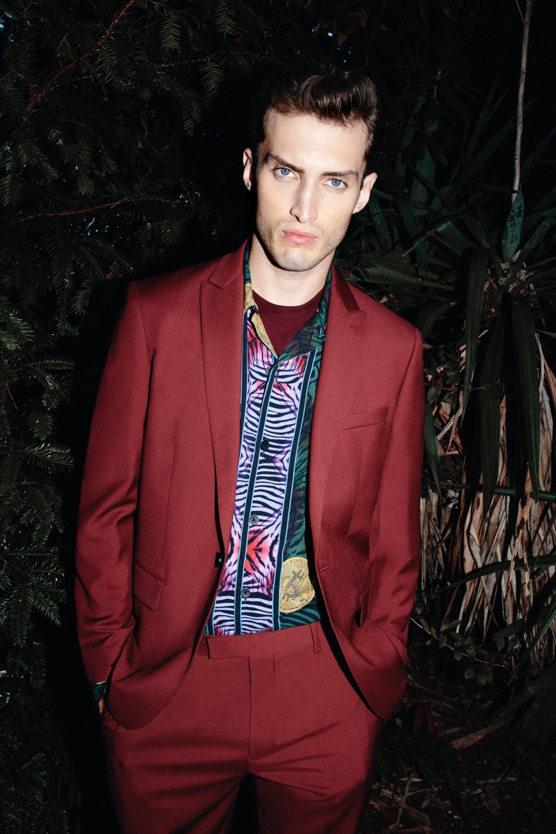 British model Charlie France wears a Charlie Casely-Hayford x Topman red suit.