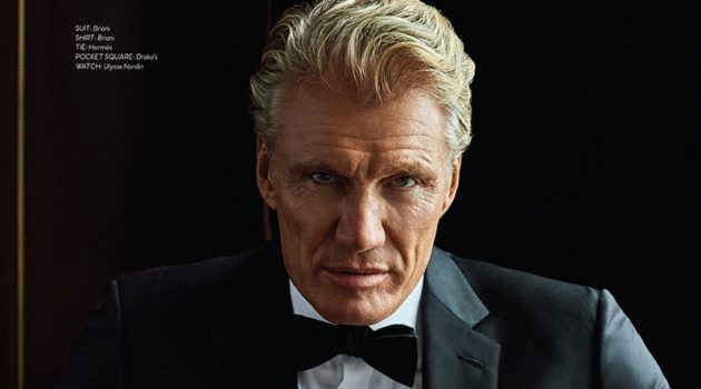 Dolph Lundgren Covers Haute Living, Discusses 'Creed II' Donning a Brioni tuxedo and shirt, Dolph Lundgren also wears a Hermès bow-tie, Drake's pocket square, Bruno Magli boots, and an Ulysse Nardin watch.