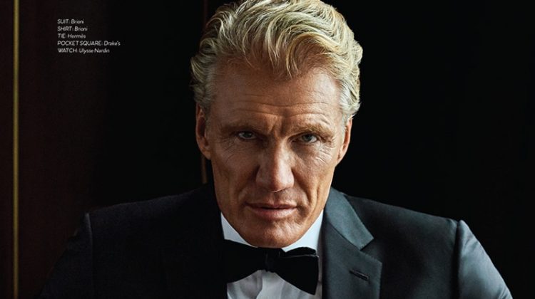 Donning a Brioni tuxedo and shirt, Dolph Lundgren also wears a Hermès bow-tie, Drake's pocket square, Bruno Magli boots, and an Ulysse Nardin watch.