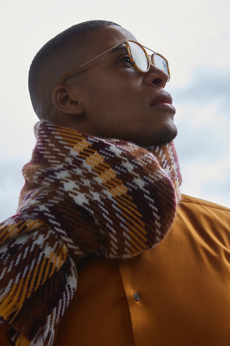 Vincent wears shirt Eterna, scarf Reserved, and sunglasses Kerbholz.