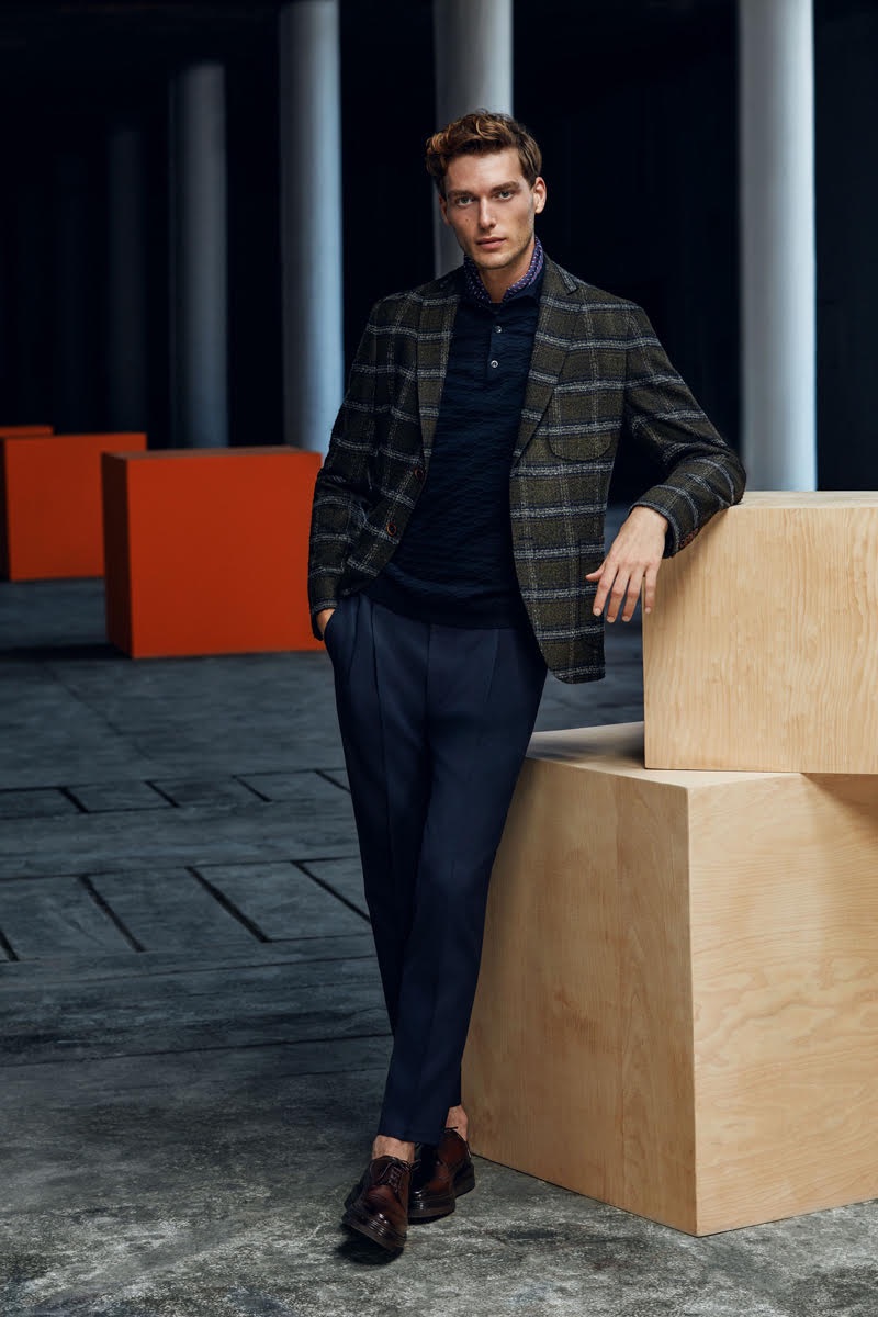 A chic vision, Nikola Jovanovic wears a sleek look from Lufian's fall-winter 2018 collection.