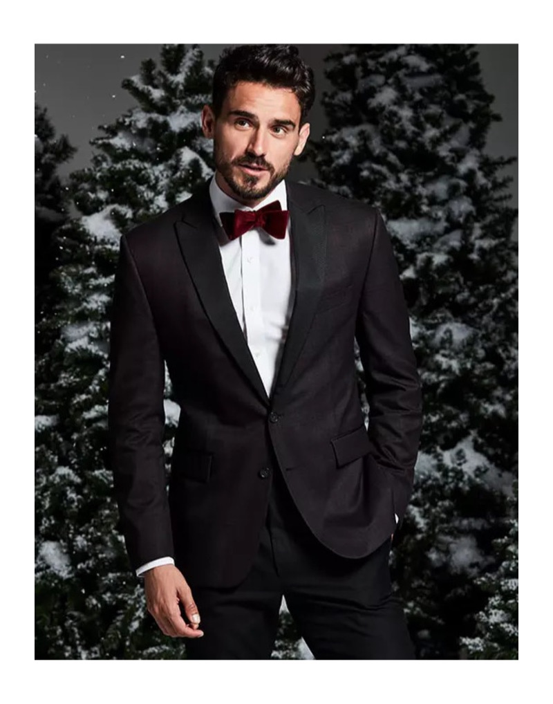 Winter Wedding: Arthur Kulkov is dashing in a Ryan Seacrest Distinction burgundy check dinner jacket and velvet bow-tie.