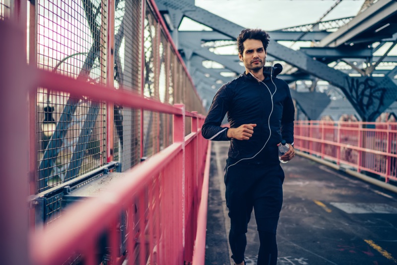 Man Running in Tracksuit Pants