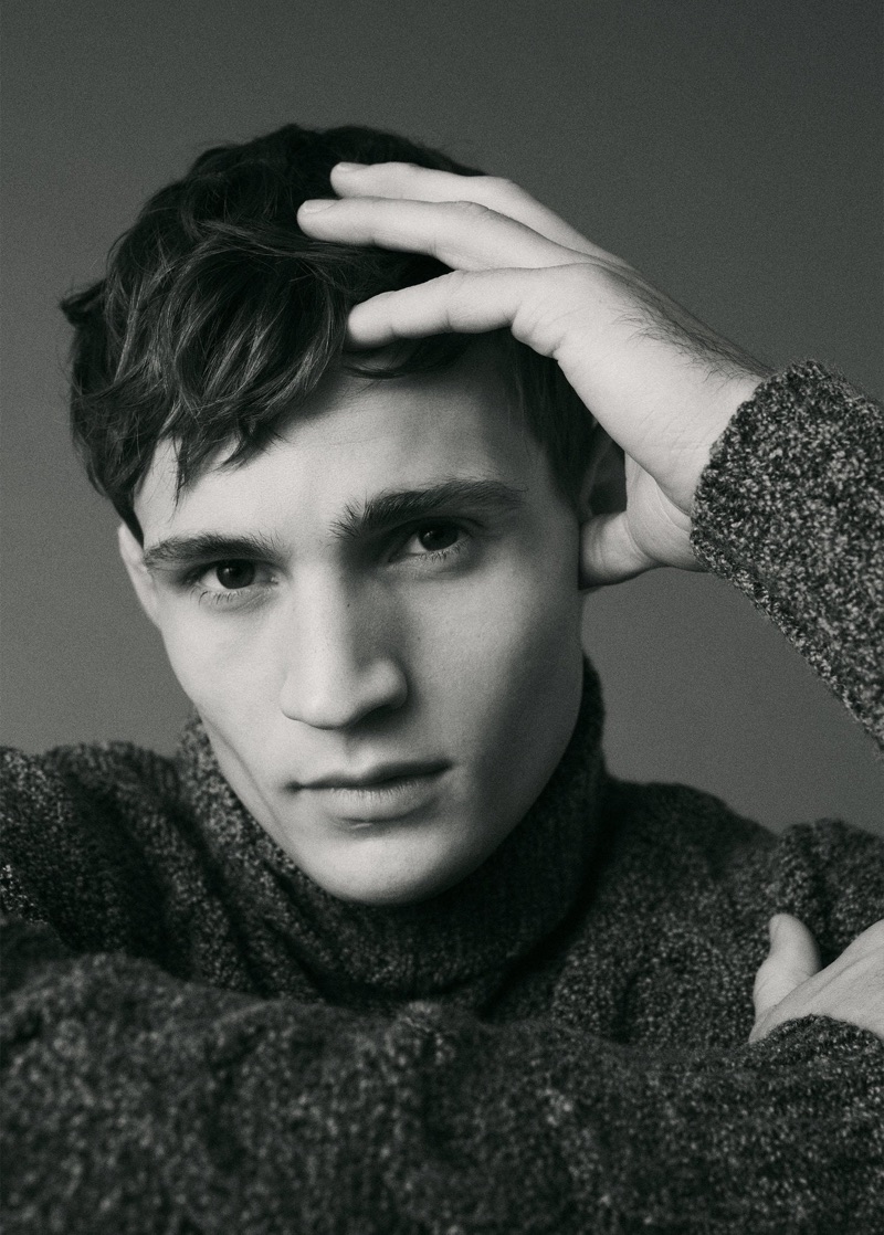 Ready for his close-up, Julian Schneyder dons a turtleneck sweater by Mango Man.