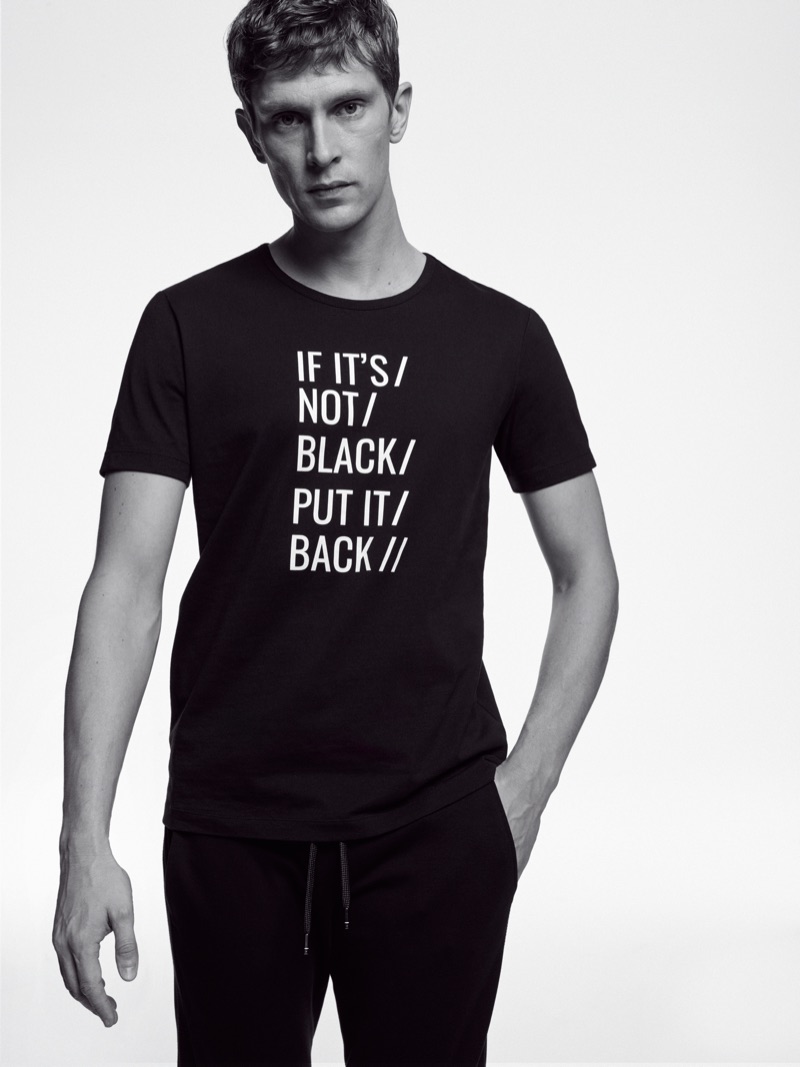 Making a statement, Mathias Lauridsen wears a t-shirt from Marc O'Polo's Black Fashion Week capsule collection.