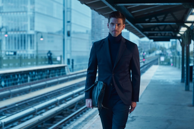 A sleek vision, Johannes Huebl wears a suit and turtleneck from Massimo Dutti.