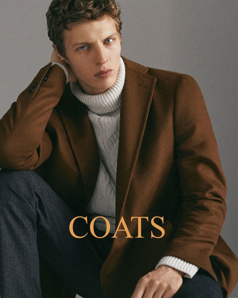 A chic vision, Tim Schuhmacher  dons a brown coat for Massimo Dutti's holiday 2018 gift guide.