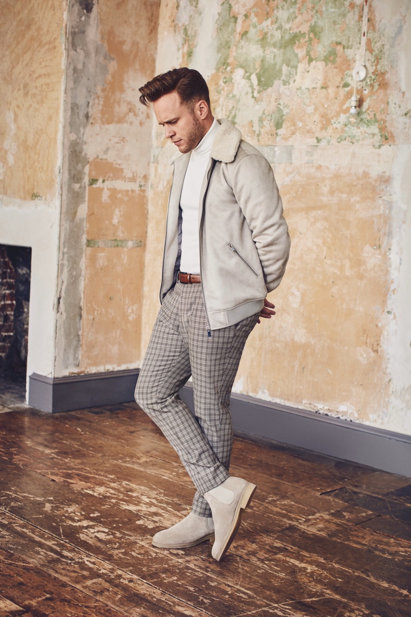 A chic vision, Olly Murs wears a faux suede fleece collar jacket and cropped check trousers from his River Island collaboration.