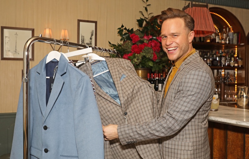 Celebrating the launch of his River Island collection, Olly Murs shows off pieces at an intimate dinner.