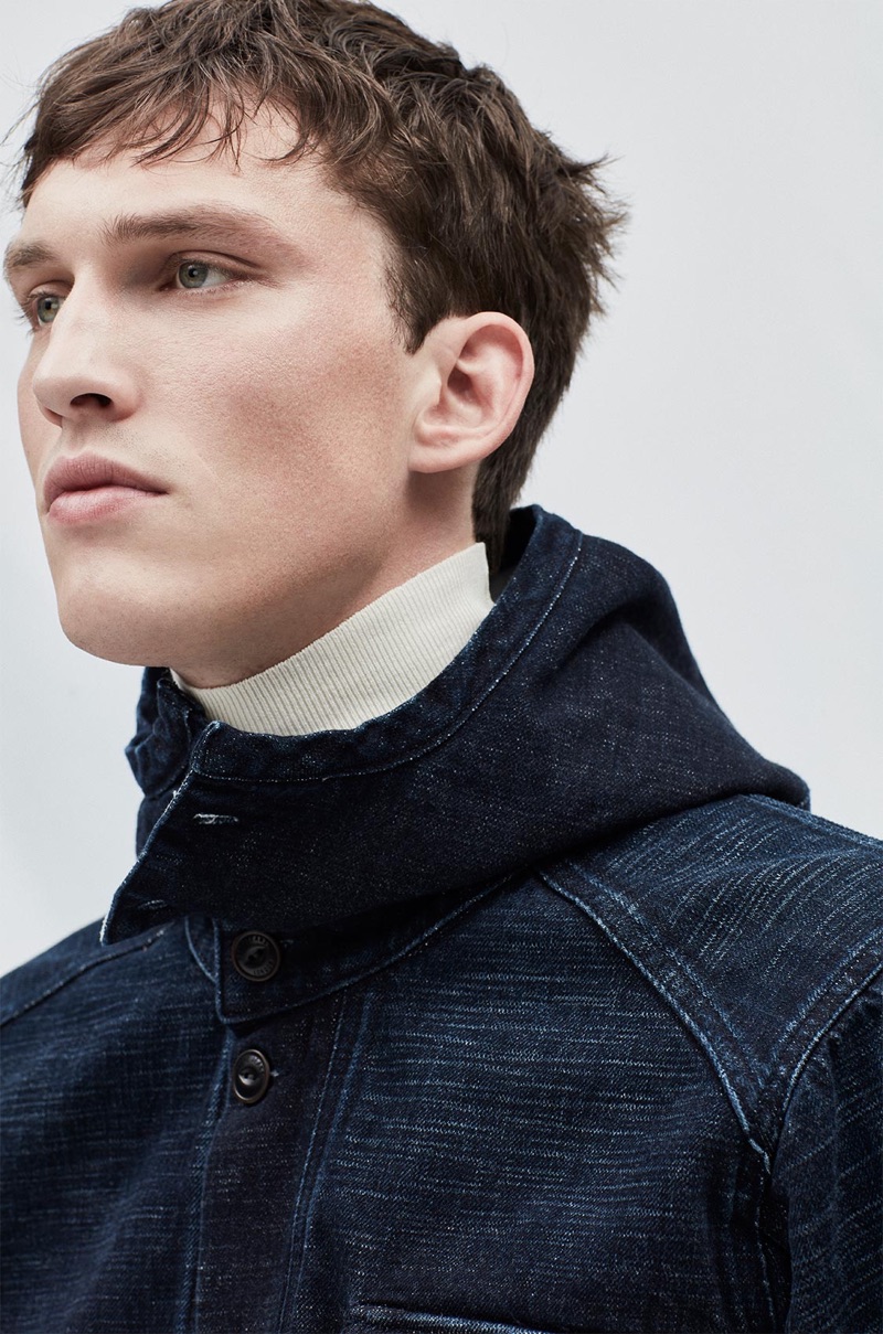 Model Malthe Lund Madsen sports a hooded denim jacket from Pepe Jeans.