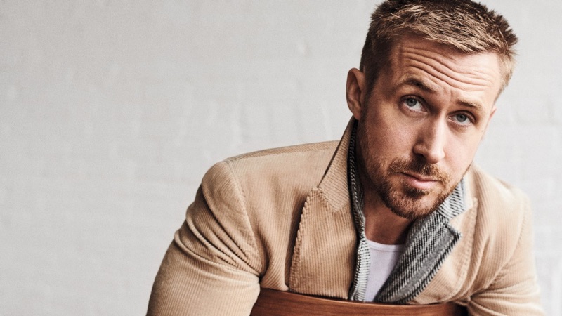 Actor Ryan Gosling sports a Dolce & Gabbana coat with a Z Zegna polo.