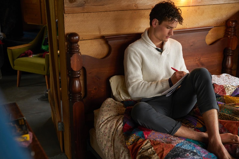 Donning a shawl neck sweater, Simon Nessman appears in North Sails' fall-winter 2018 campaign.