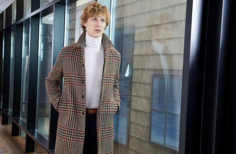 Donning a check coat, Sven de Vries appears in Valstar's fall-winter 2018 campaign.