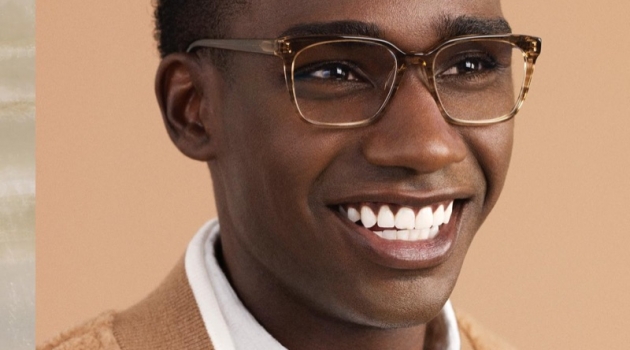 Icy or Warm? Warby Parker Unveils Winter '18 Glasses All smiles, Bakay Diaby dons Warby Parker's Hughes glasses in Chestnut Crystal.