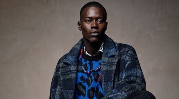 Alpha Dia, Kit Butler & Saif Khorchid Don Zara Knitwear Alpha Dia dons a leopard print sweater with a check coat and pinstripe trousers from Zara Man.