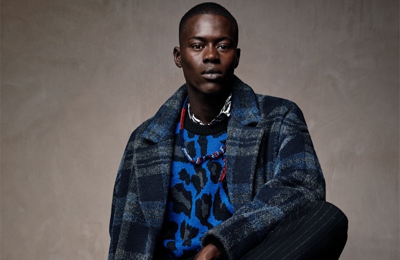 Alpha Dia, Kit Butler & Saif Khorchid Don Zara Knitwear Alpha Dia dons a leopard print sweater with a check coat and pinstripe trousers from Zara Man.