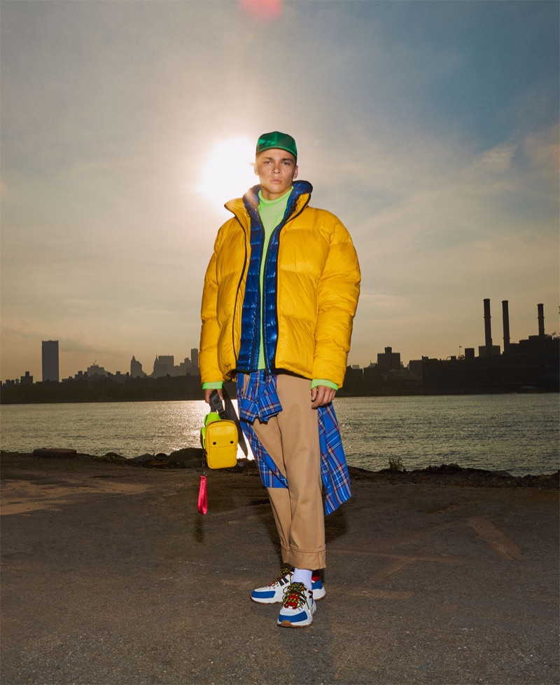 Making a statement in yellow, Leonard Mushiete sports a Zara Man puffer jacket.