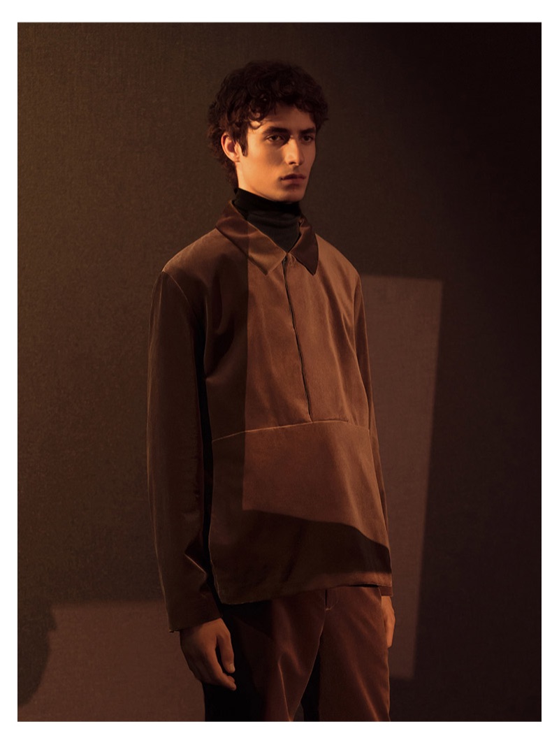 Warming up to velour, Oscar Kindelan wears a coordinated outfit by COS.