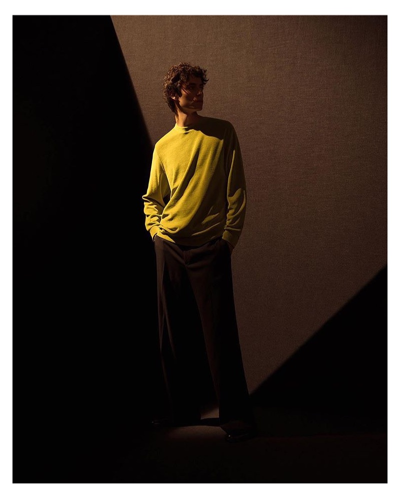 Making a splash in a pop of color, Oscar Kindelan wears COS.