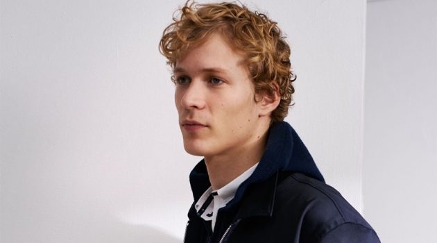 On the Bright Side: Sven de Vries Sports Club Monaco Fashions Dutch model Sven de Vries wears a Club Monaco aviator bomber, striped shirt, donegal zip hoodie, and pants.