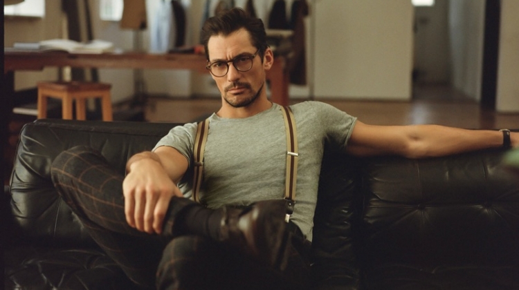 David Gandy is a smart vision in a fitted t-shirt, suspenders, and windowpane print trousers.