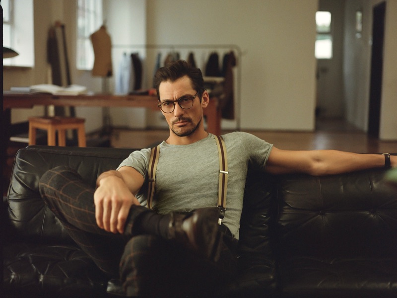 David Gandy is a smart vision in a fitted t-shirt, suspenders, and windowpane print trousers.