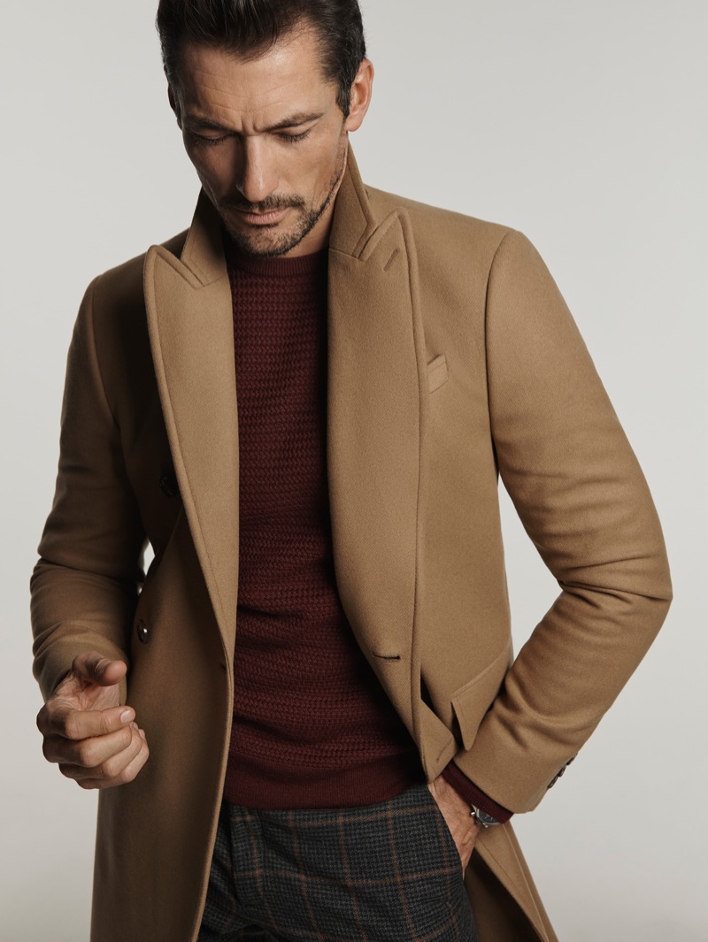 Donning a camel coat, David Gandy champions menswear essentials from Mango.