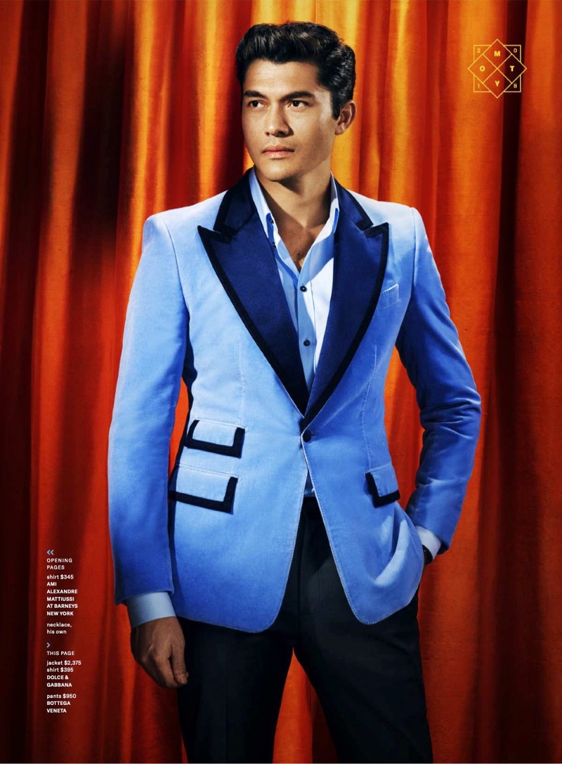 A sharp vision, Henry Golding dons a shirt and jacket by Dolce & Gabbana with Bottega Veneta pants.