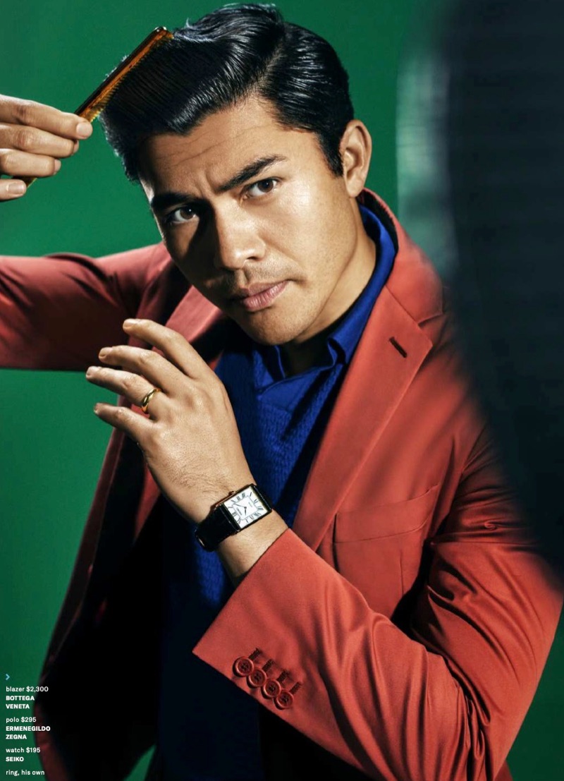 Connecting with GQ, Henry Golding wears a Bottega Veneta blazer, Ermenegildo Zegna polo, and Seiko watch with his own ring.