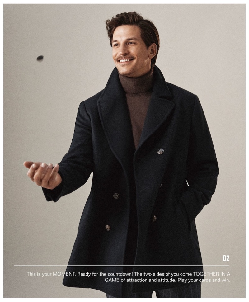 Jarrod Scott dons a peacoat and turtleneck sweater with pinstripe pants from Massimo Dutti.