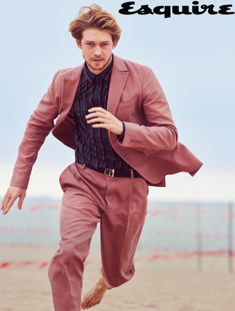 On the move, Joe Alwyn wears a jacket, shirt, and trousers by Bottega Veneta. He also sports a Louis Vuitton belt. » Joe Alwyn Heads to Coney Island with Esquire, Talks 'Mary, Queen of Scots' On the move, Joe Alwyn wears a jacket, shirt, and trousers by Bottega Veneta. He also sports a Louis Vuitton belt.