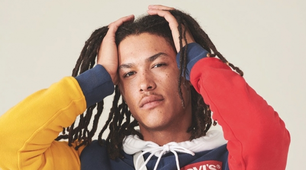 Levi's Red Tab Channels 90s Skater Cool with Spring '19 Collection James Magee rocks a color blocked hoodie from Levi's Red Tab's spring-summer 2019 collection.