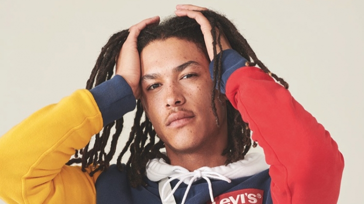 James Magee rocks a color blocked hoodie from Levi's Red Tab's spring-summer 2019 collection.