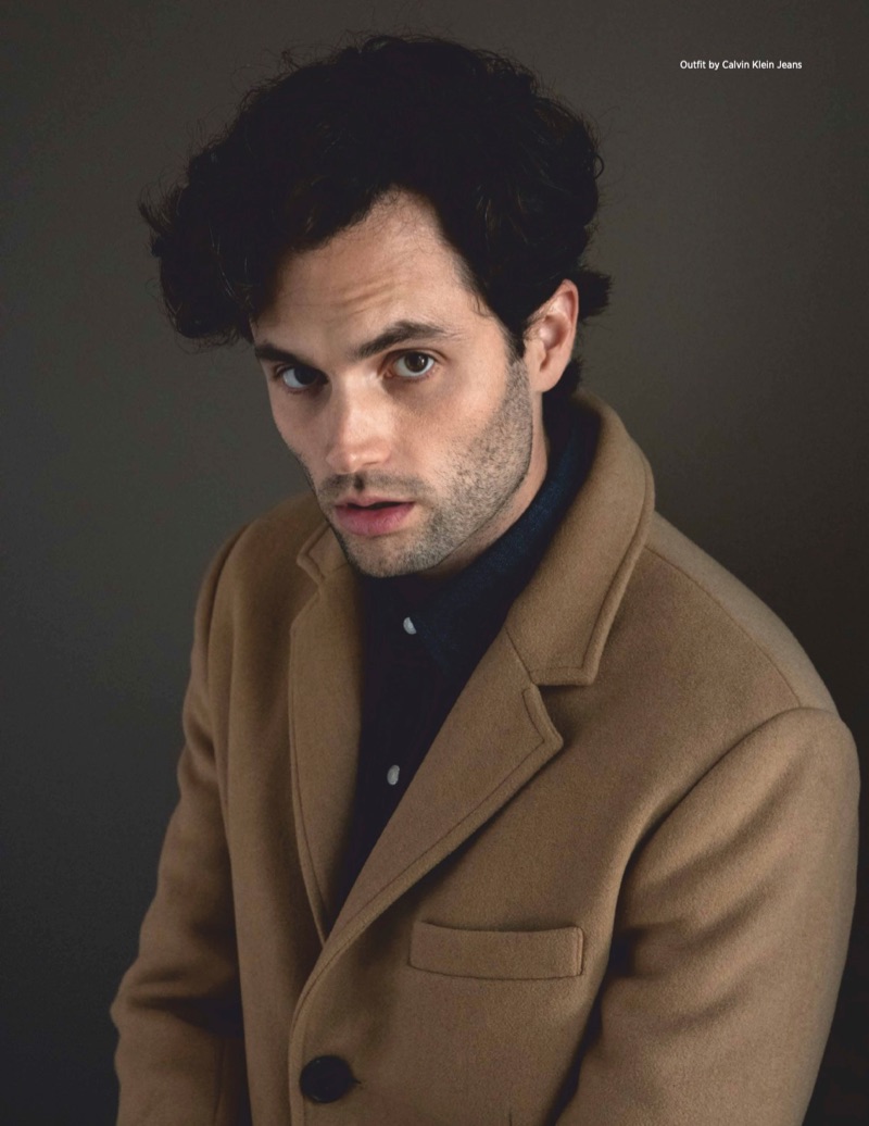 Connecting with Da Man, Penn Badgley dons a Calvin Klein Jeans coat and shirt.