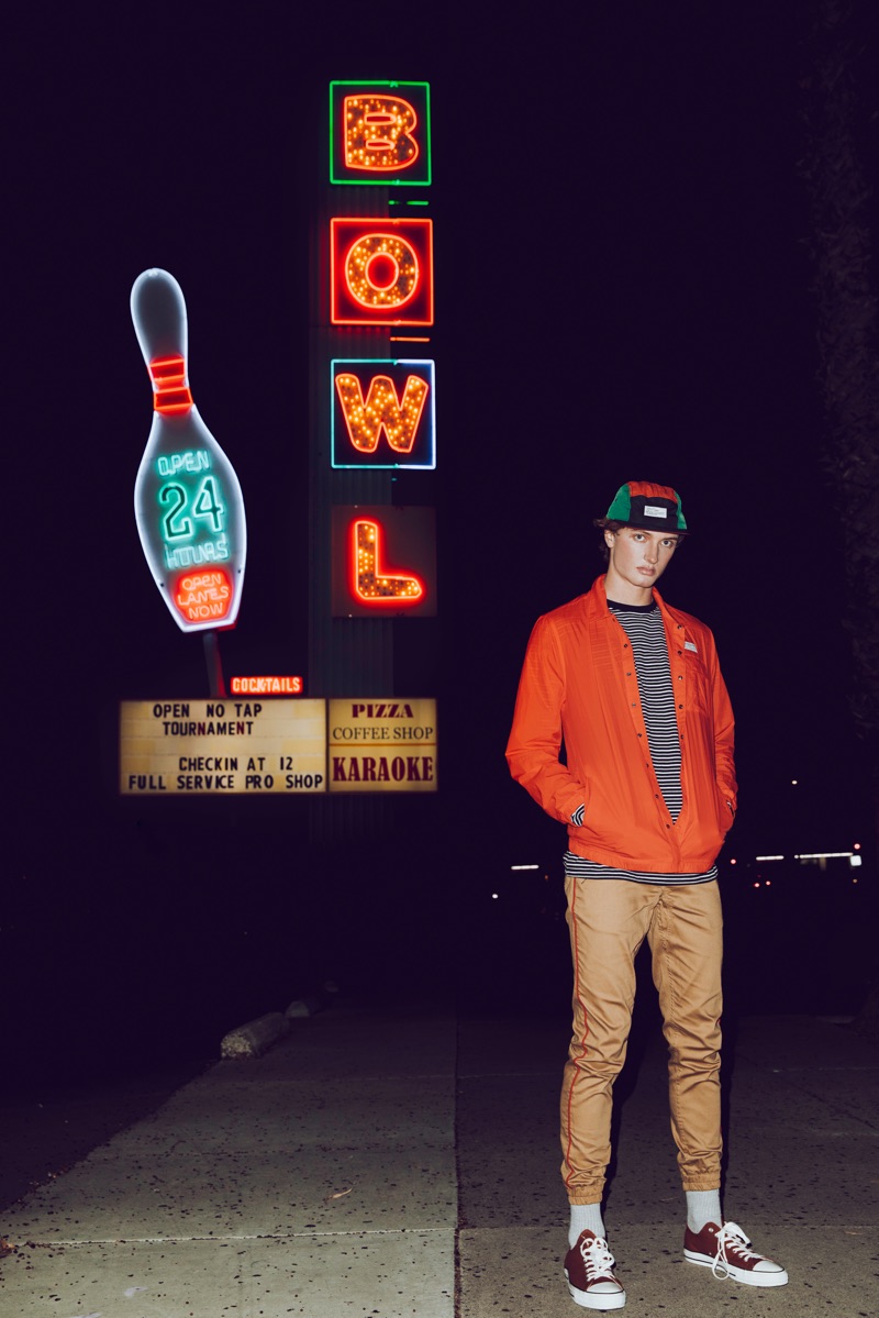 Showcasing holiday style from Publish Brand, Jason Kekich poses in front of Linbrook Bowling Center.