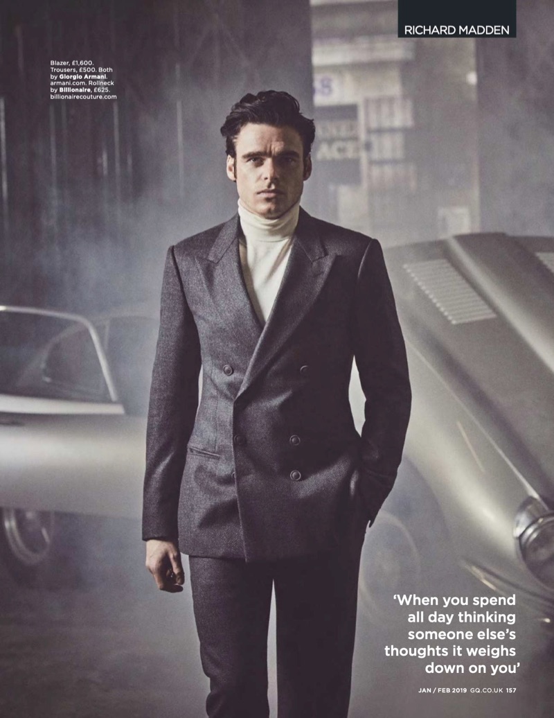 Connecting with British GQ, Richard Madden wears a double-breasted suit by Giorgio Armani with a Billionaire turtleneck.