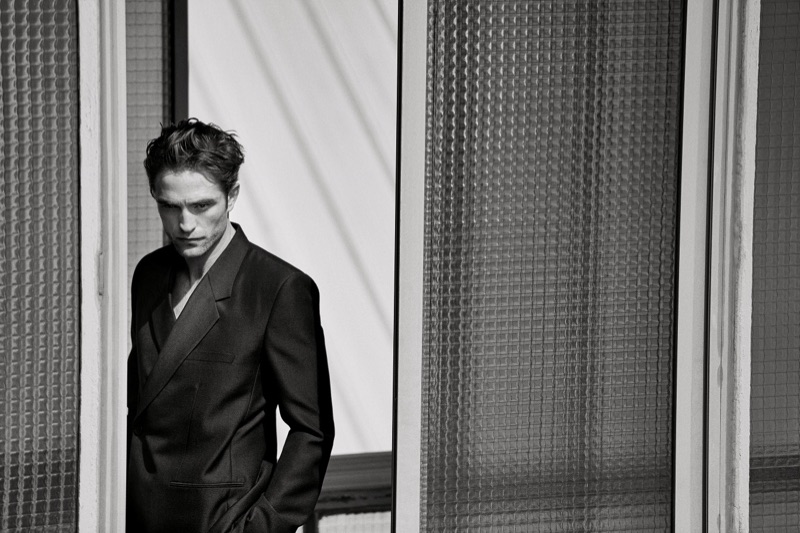 Donning a double-breasted suit, Robert Pattinson fronts Dior Men's spring-summer 2019 campaign.