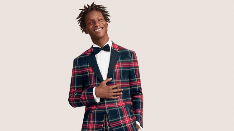 Adonis Bosso dons a wool tartan suit from Tommy Hilfiger.