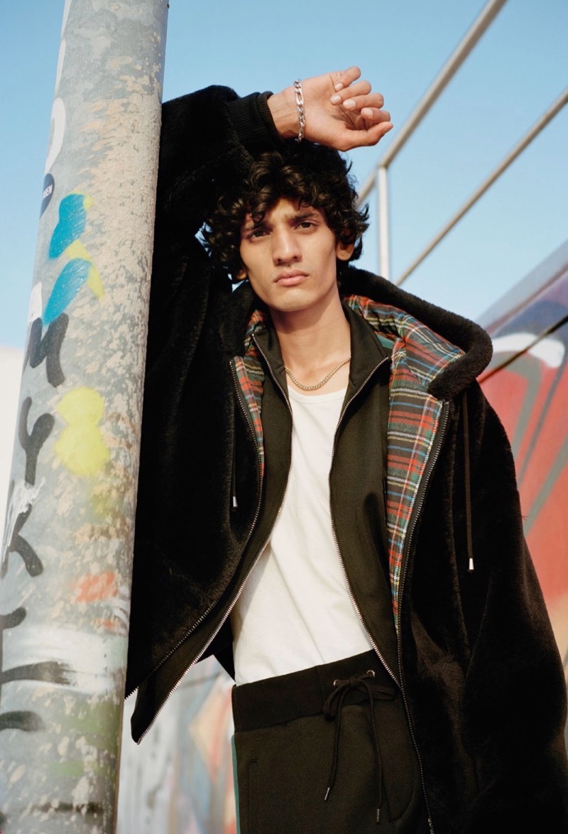 Mustafa Dawood appears in an editorial for Vogue Hommes Paris.