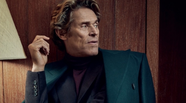 Willem Dafoe is Dashing in Sartorial Styles for The Rake A sleek vision, Willem Dafoe wears a Paul Smith double-breasted coat with a sweater and suit by Gieves & Hawkes.