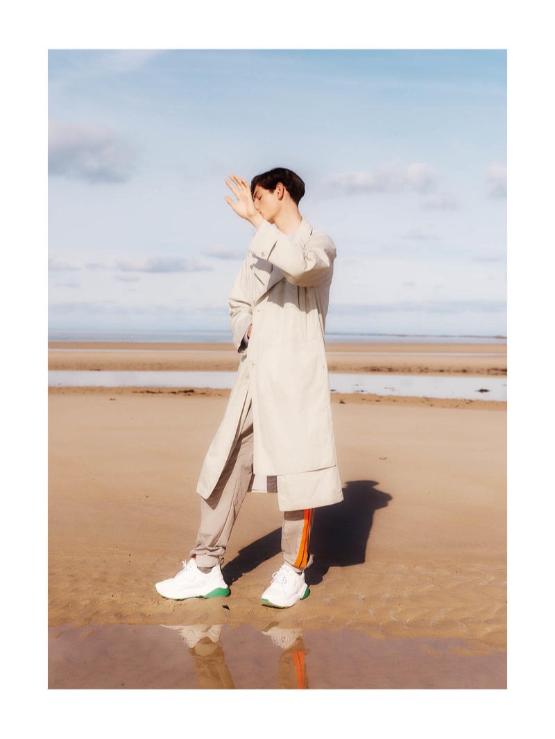 LEMAIRE coat £820; PALM ANGELS trackpants £345; PANTHERELLA socks £25; STELLA McCARTNEY sneakers £445