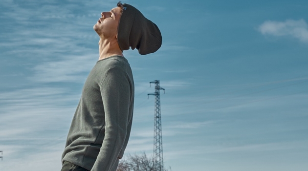 Alessandro Russi in 'Another World' Alessandro wears knit beanie RVLT, sweater Minimum, and jeans Cheap Monday.