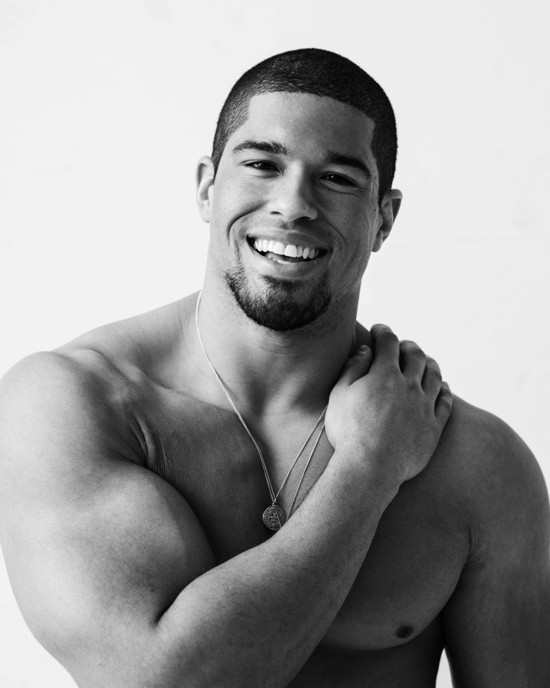 All smiles, Anthony Bowens appears in a black and white photo.