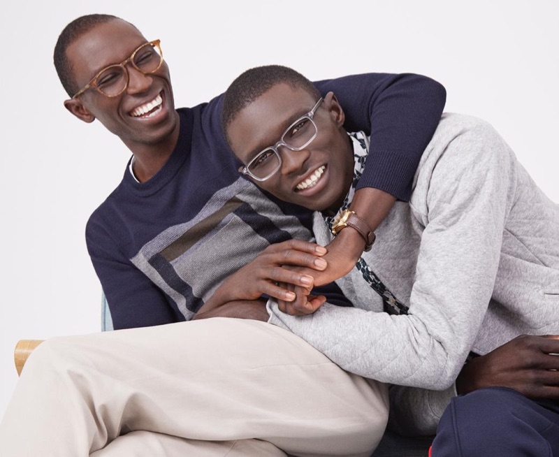 All smiles, models Armando and Fernando Cabral sport the latest styles from Warby Parker.