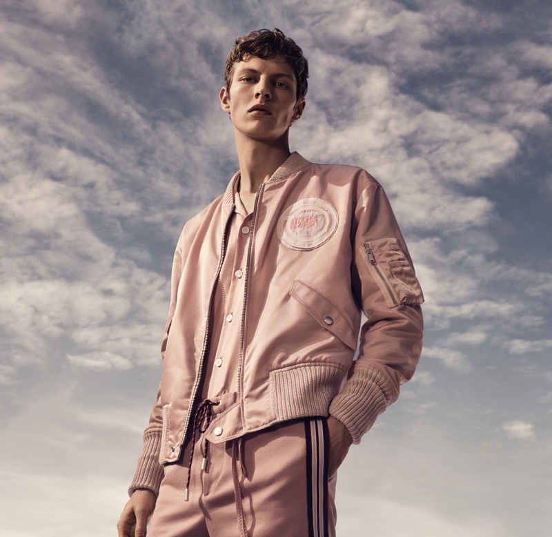 Donning a monochromatic number, Tim Schuhmacher appears in BOSS' spring-summer 2019 campaign.