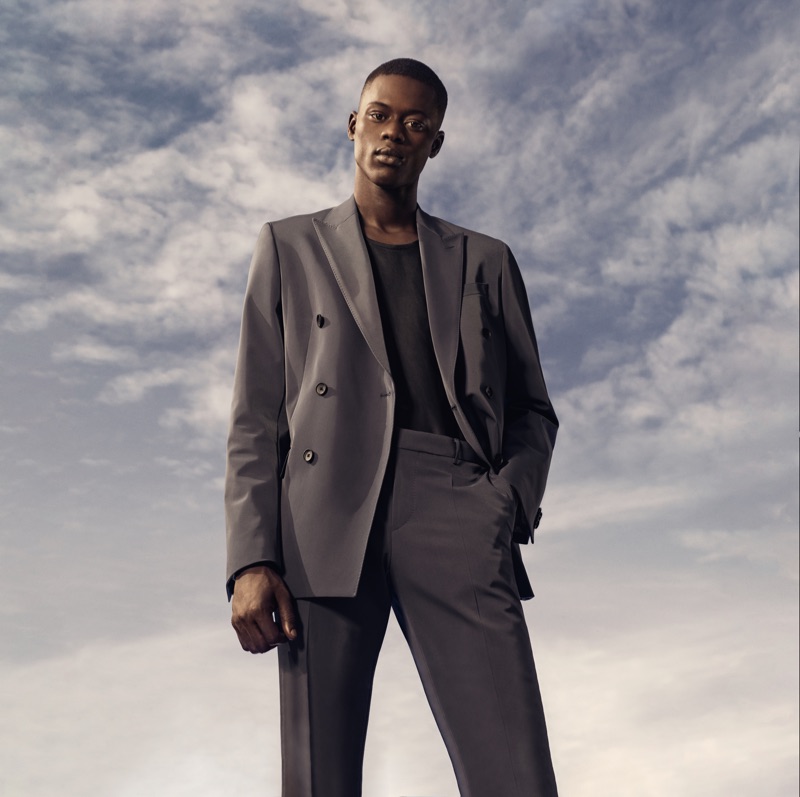 Model Alpha Dia sports a double-breasted suit for BOSS' spring-summer 2019 campaign.