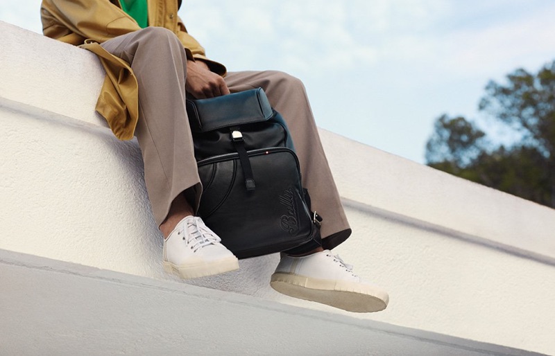 White sneakers and a black leather backpack are front and center for Bally's spring-summer 2019 campaign.